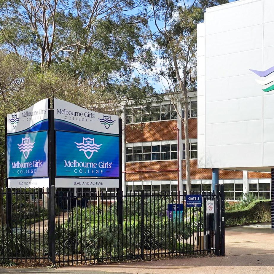 Photo of a V-shape LED screen installed at Melbourne Girls College, showcasing modern digital signage.